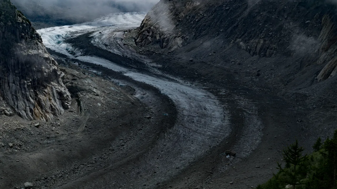 Glacier winding through a mountain valley